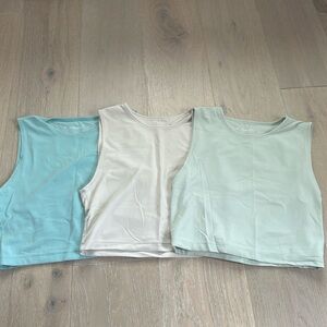 Aritzia TNA action muscle tanks BUNDLE OF 3